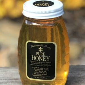 16oz raw honey in glass jar