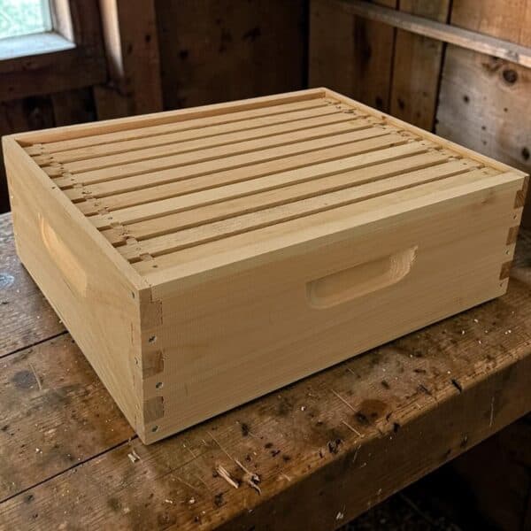Photo of a medium honey super with frames