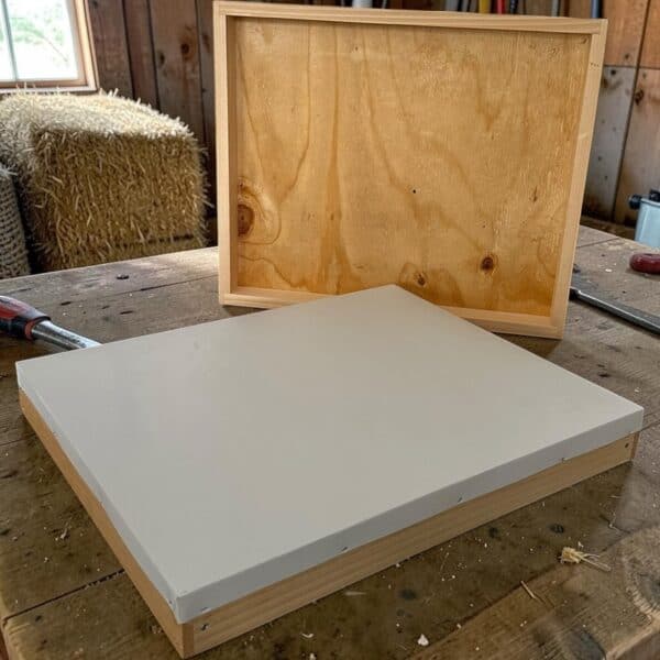 Photo of a telescoping cover for a beehive.